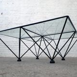 A glass and steel coffee table