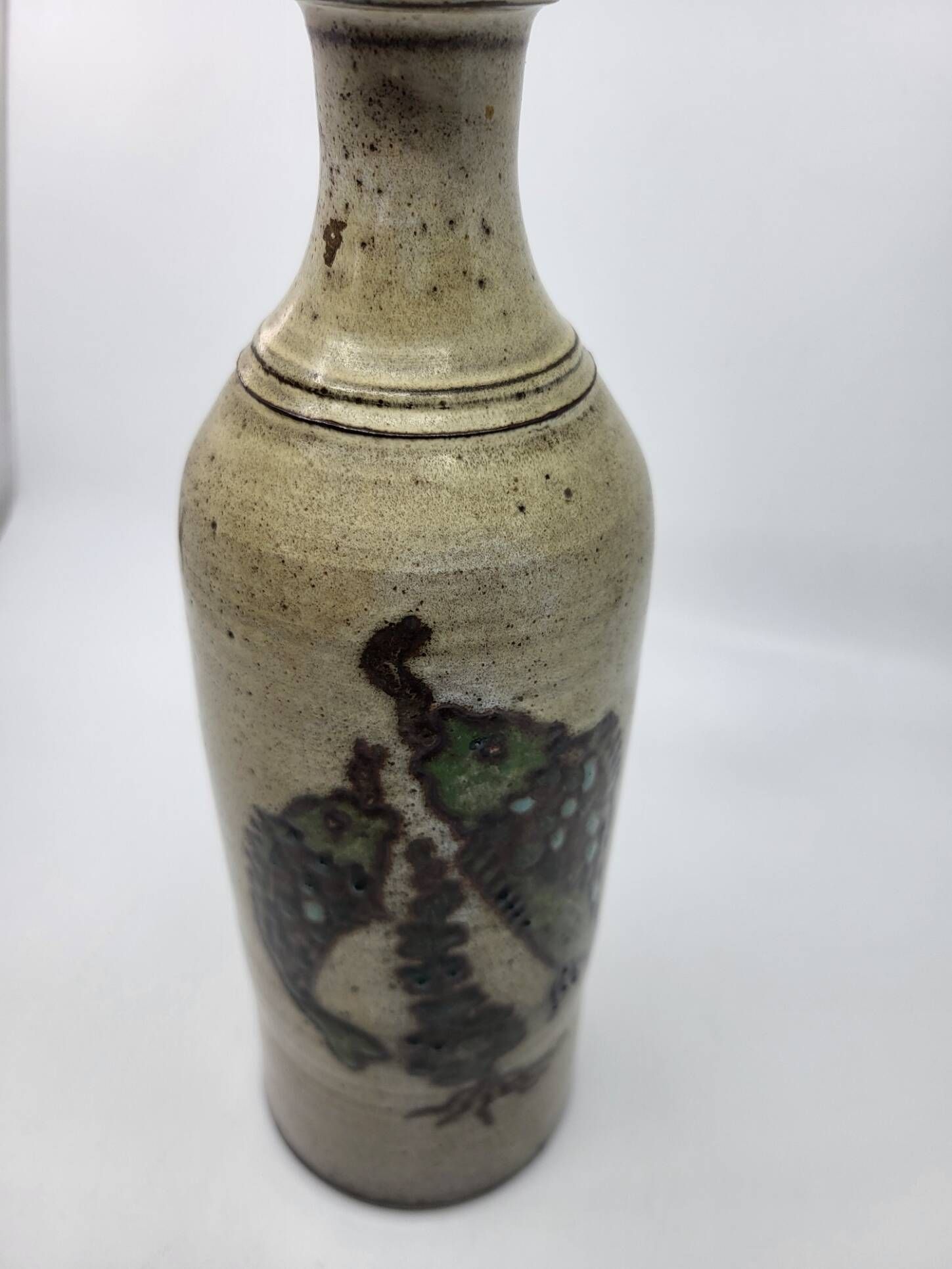 Vintage bottle vase in ceramic stoneware with fish decoration circa 1970/80.