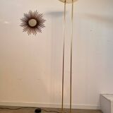 Old golden brass floor lamp with Italian design bulb from the 70s vintage