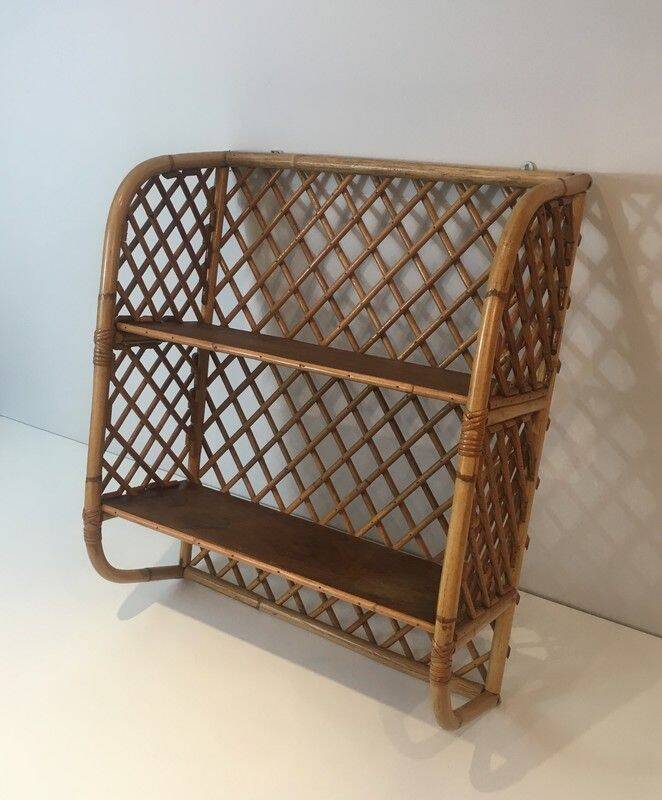 Rattan wall shelf. Attributed to Audoux-Minet