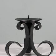 Vintage wrought iron chandelier for large candle.