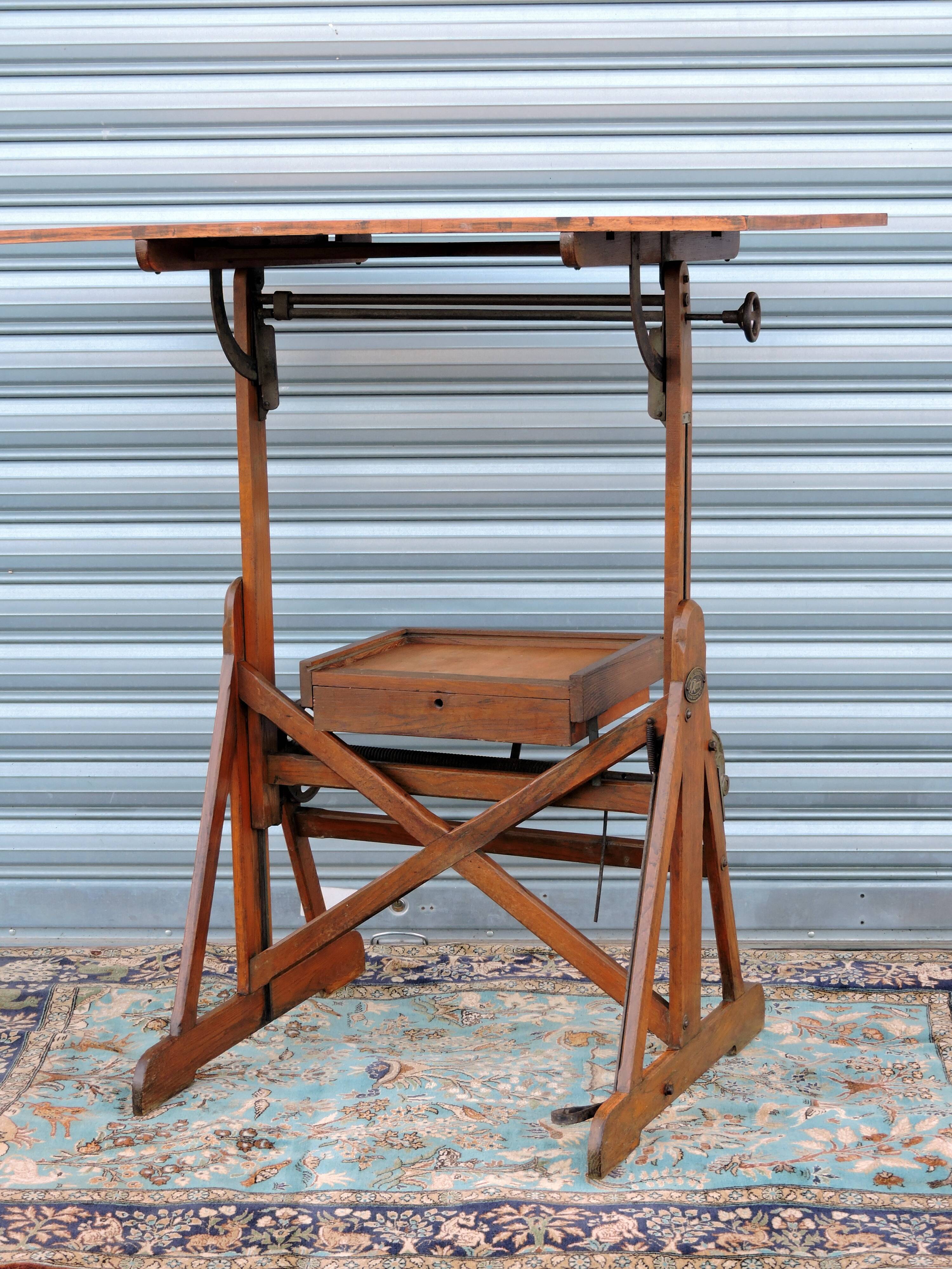 Architect's table has industrial adjustable design H Morin betting
