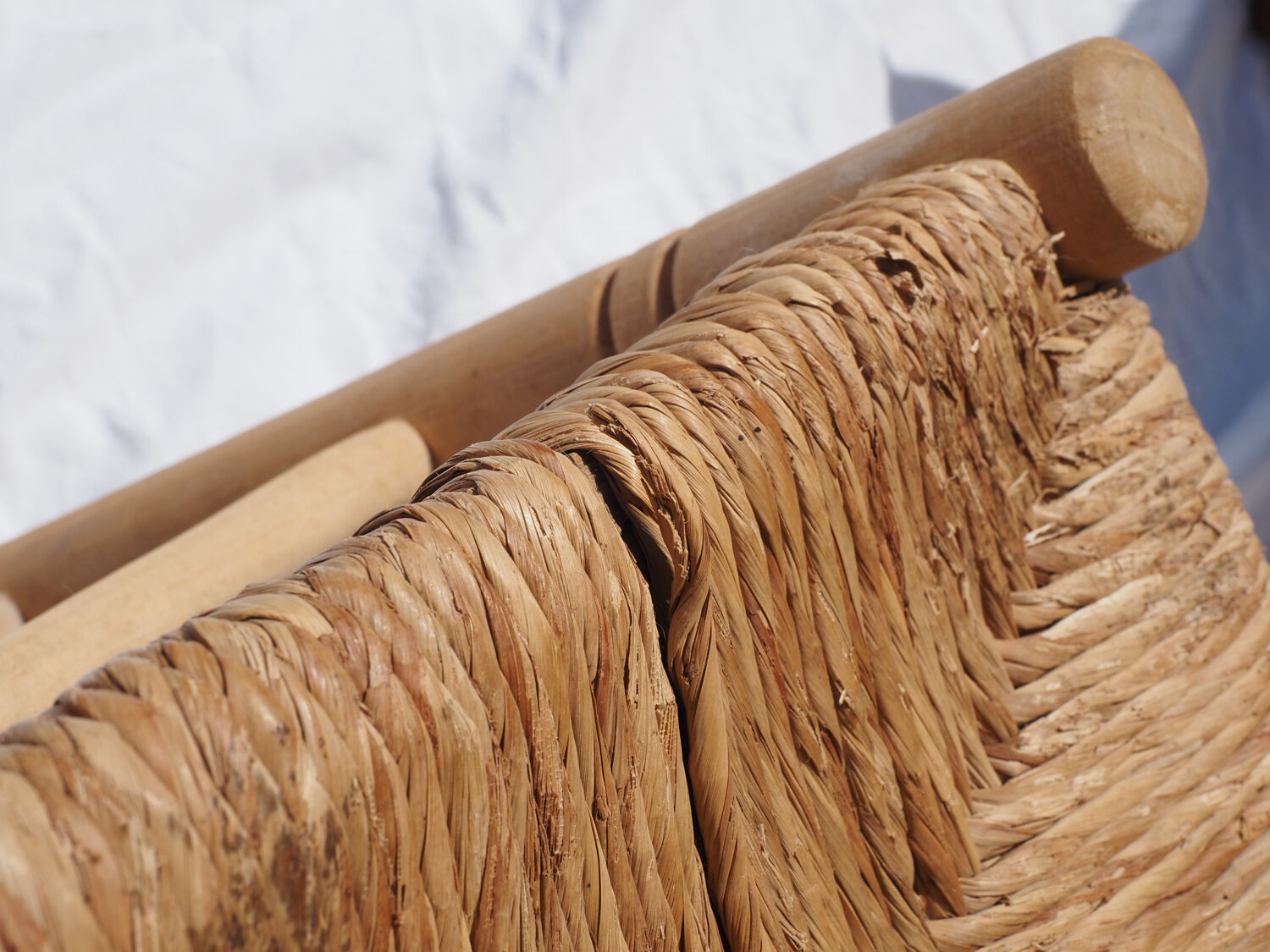 Farm stool made of wood and straw