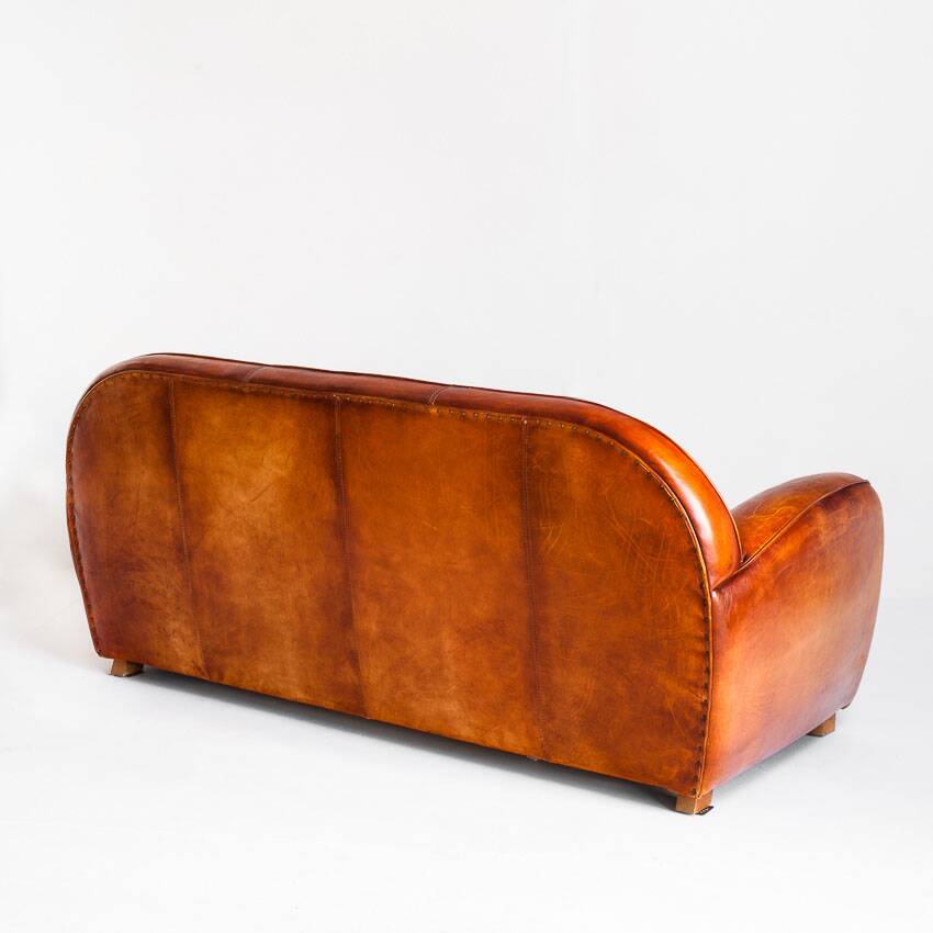 Vintage leather club sofa. Art Deco style. France, 1950s. (sofa convertible into bed)