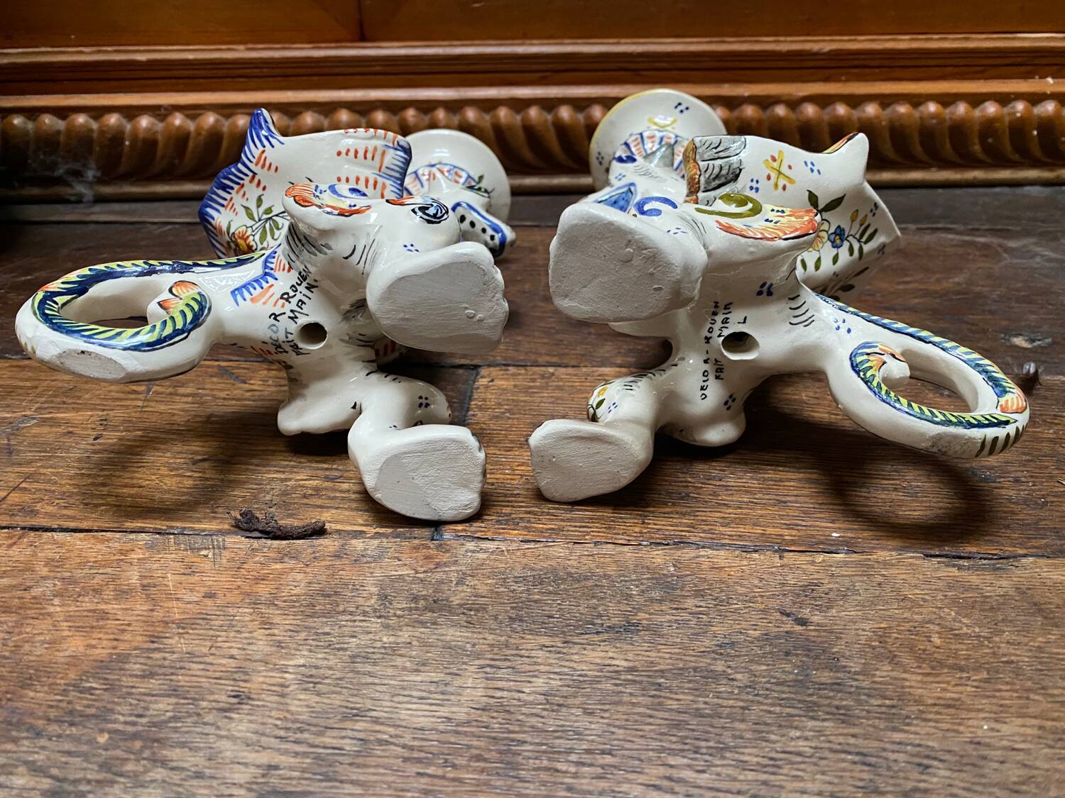 Griffon candlesticks in Old Rouen earthenware