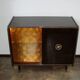 A vintage cabinet with a record player and a bar, 1960s.
