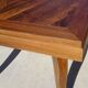 Antique solid walnut table with marquetry and extensions.
