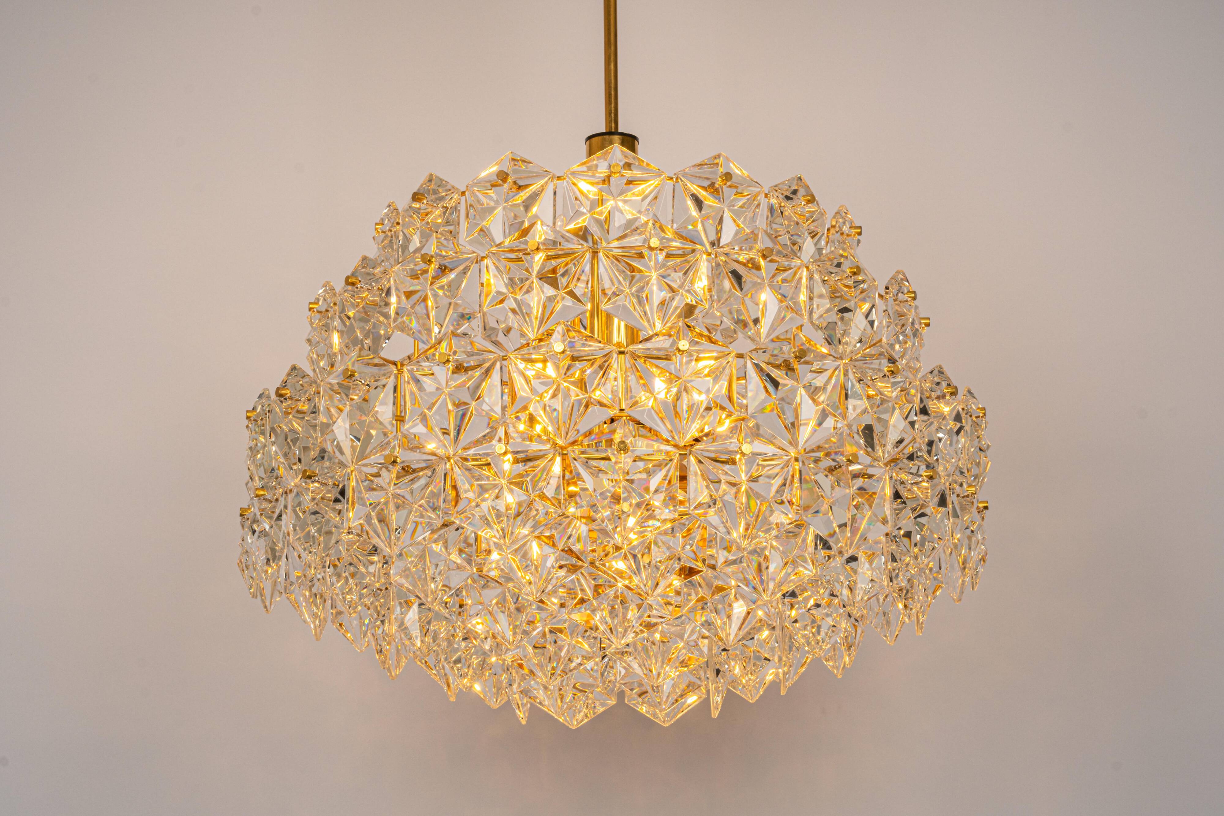 Chandelier, brass and crystal glass by Kinkeldey, Germany, 1970s.