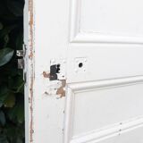 Communication door H220xW80.5cm, old panelled with moulding.