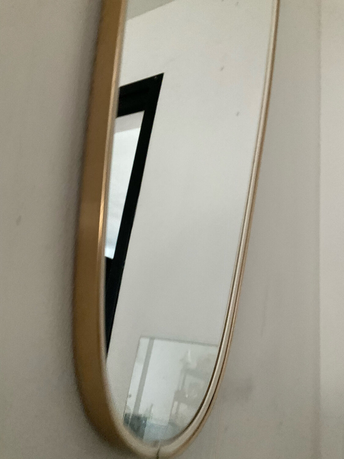 Asymmetrical free-form mirror from the 60s