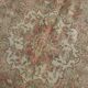 Tapis persan ancien noué main rouge corail, médaillon central floral