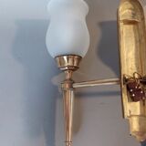 Neoclassical Torch two-arm wall lamp in solid brass, circa 1940
