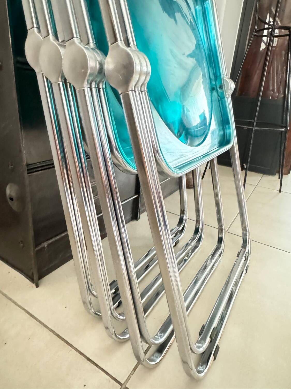 Set of 4 blue Plia folding chairs by Castelli