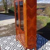 Glass library with rosewood marquetry in the Louis XV style.
