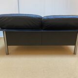 Pair of black leather sofas produced by Poltrona Frau, circa 1980/1990.