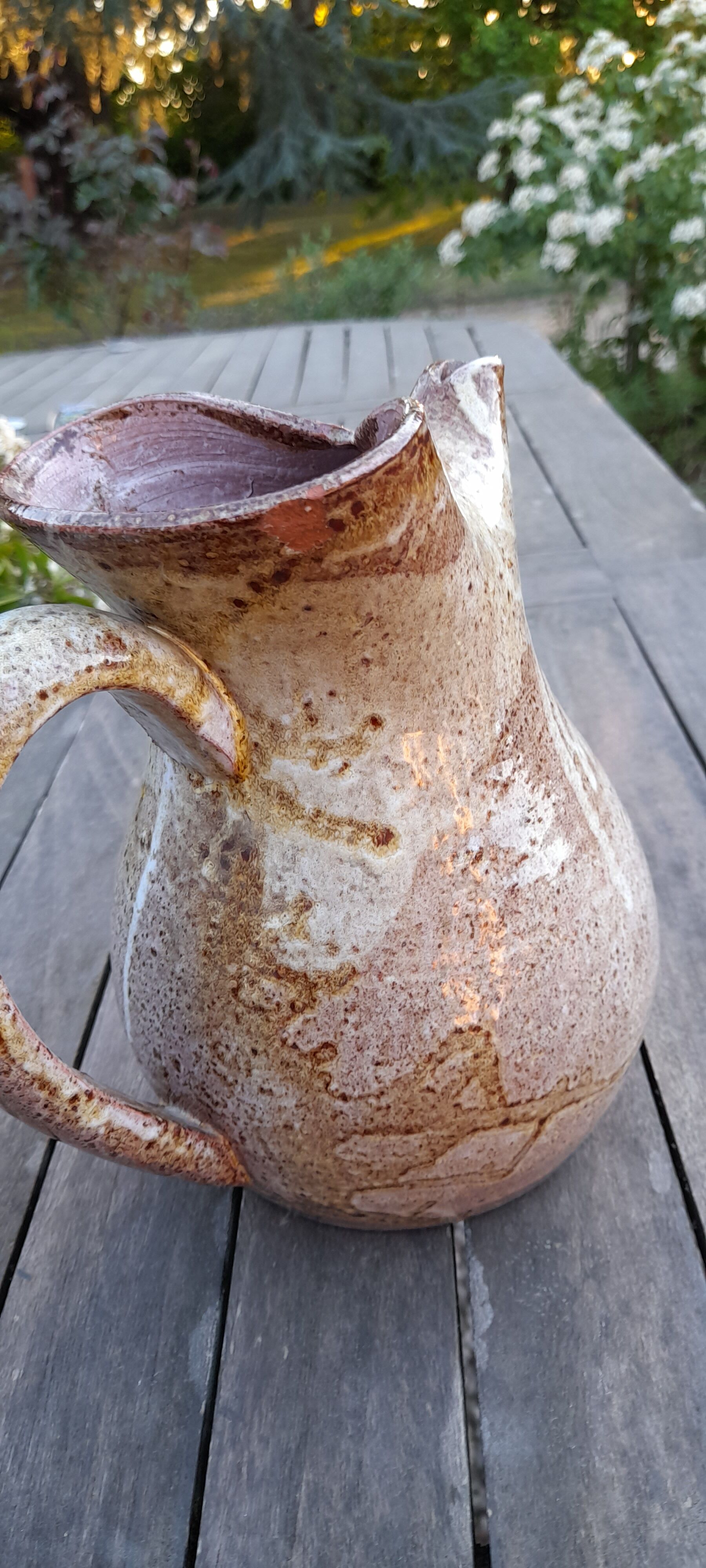 Old cider pitcher in varnished sandstone early 20th century
