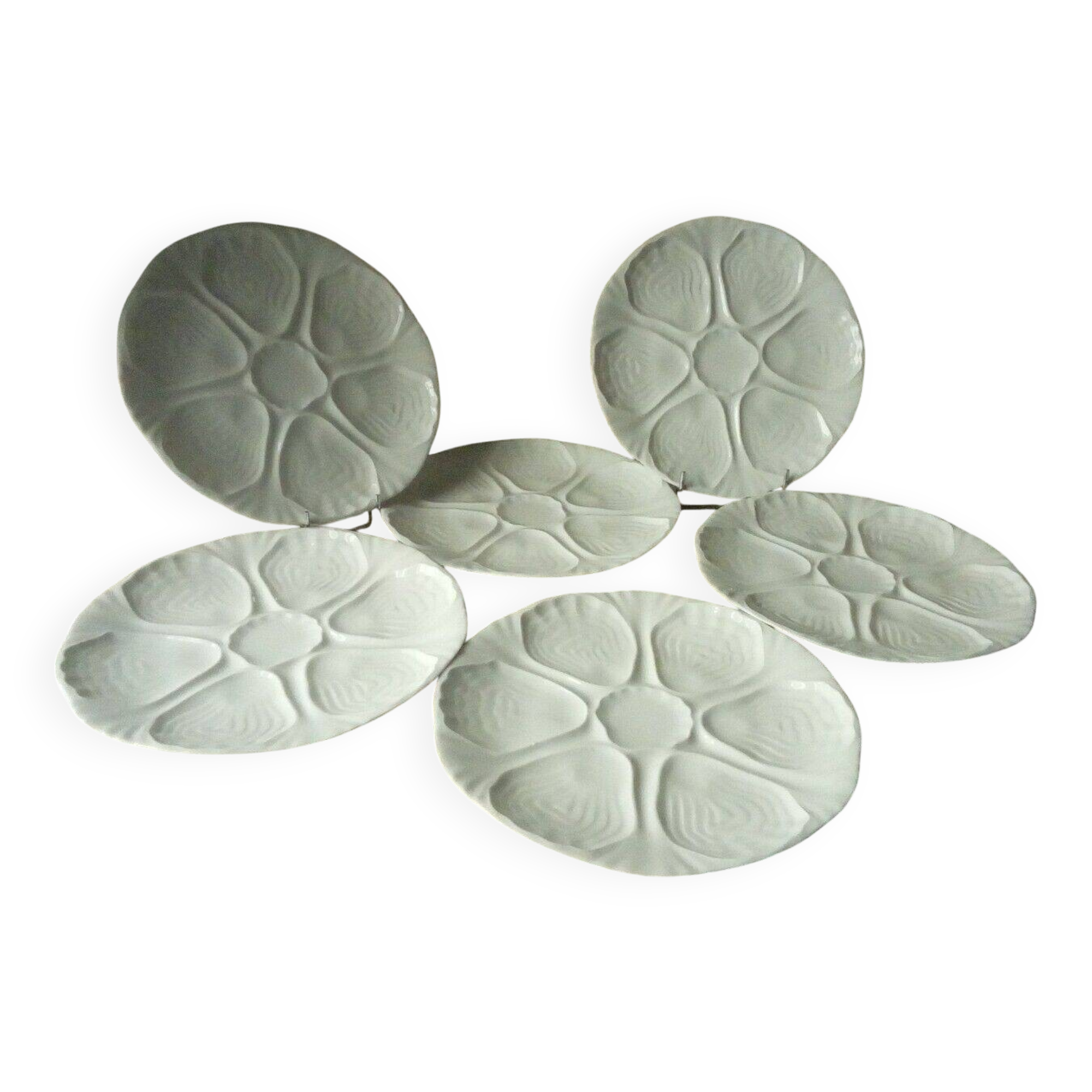 White porcelain oyster plates