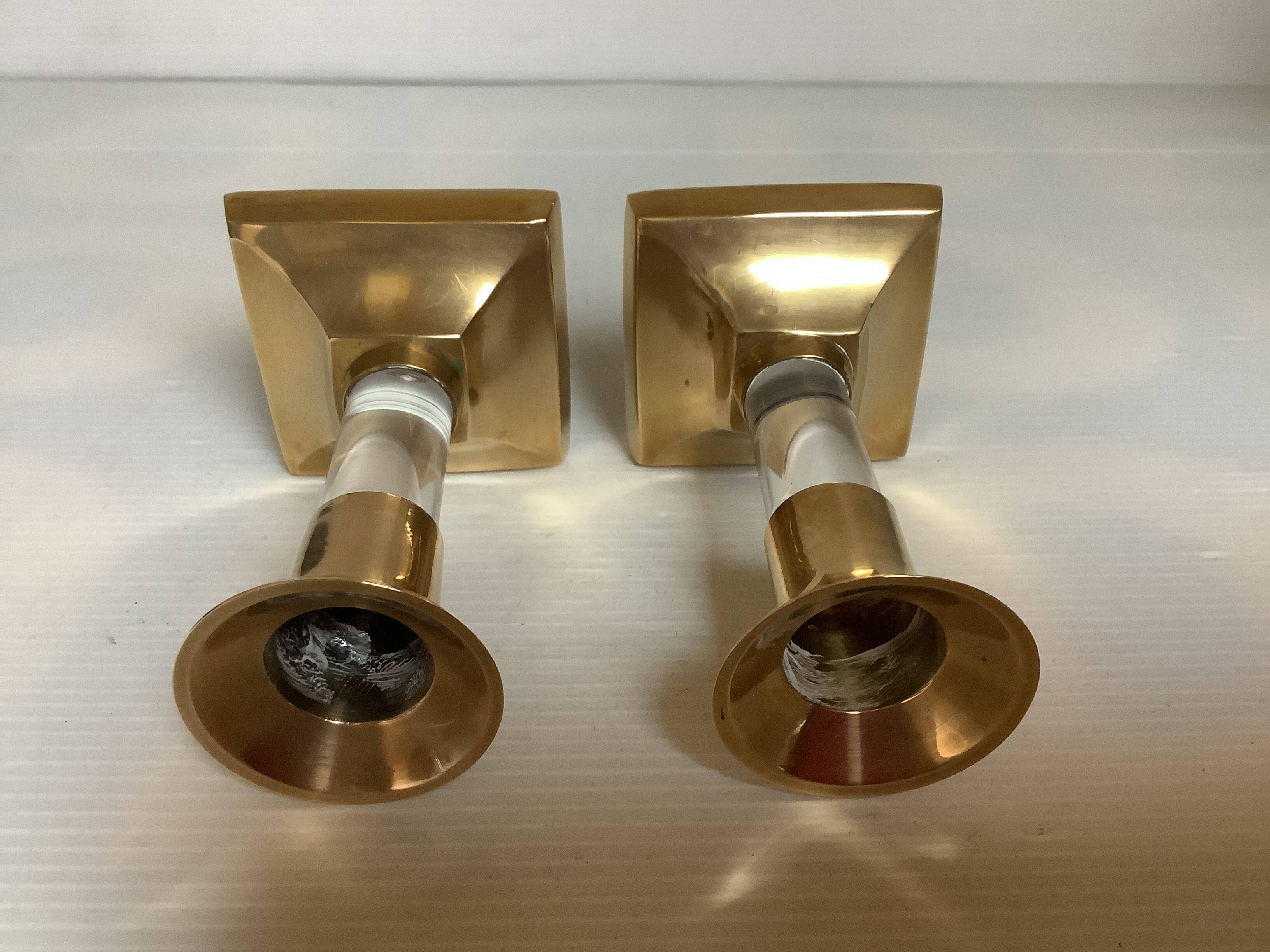 Pair of small brass and glass candlesticks