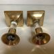 Pair of small brass and glass candlesticks