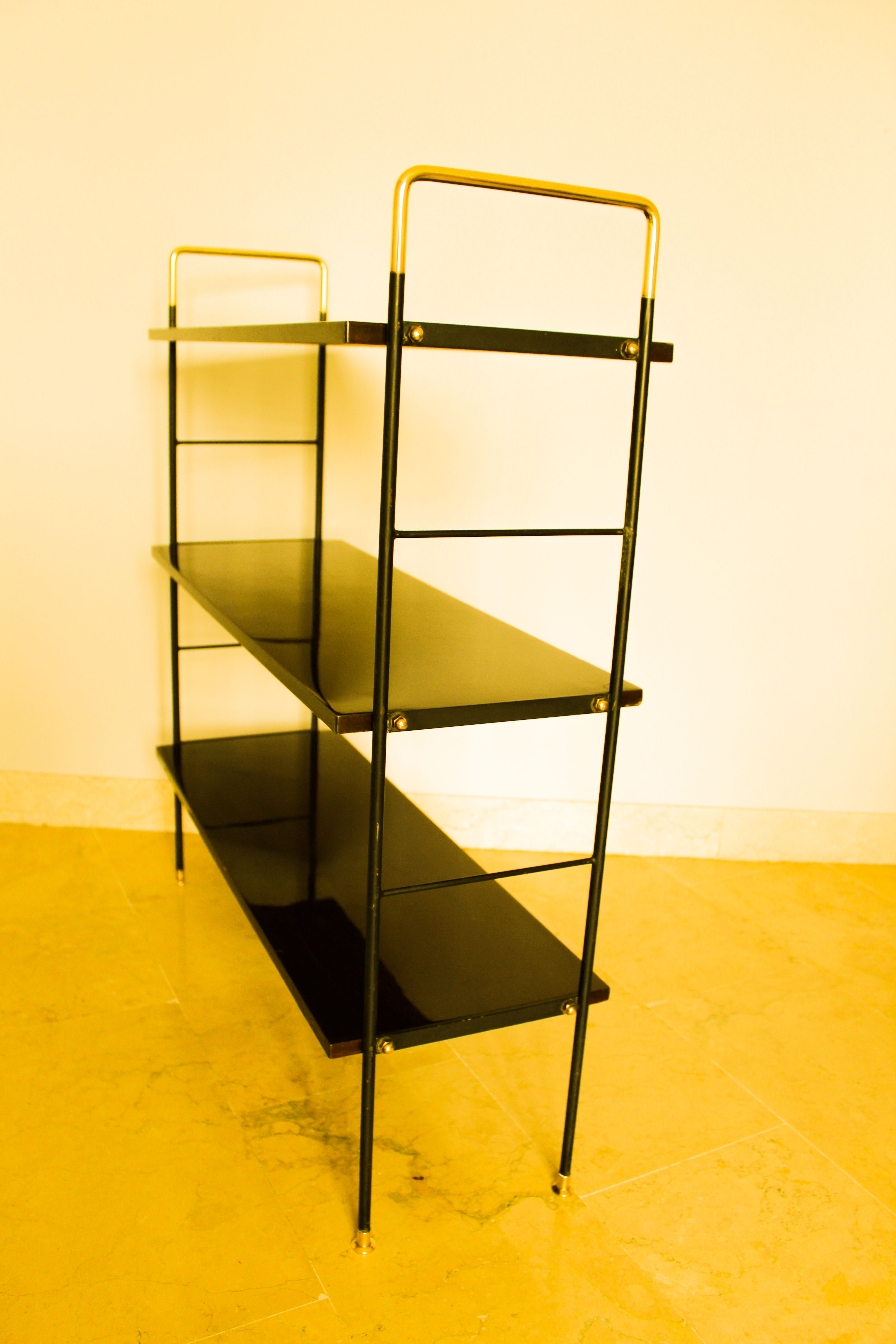 Etager, 1950s Italian bookcase in rosewood, brass and iron