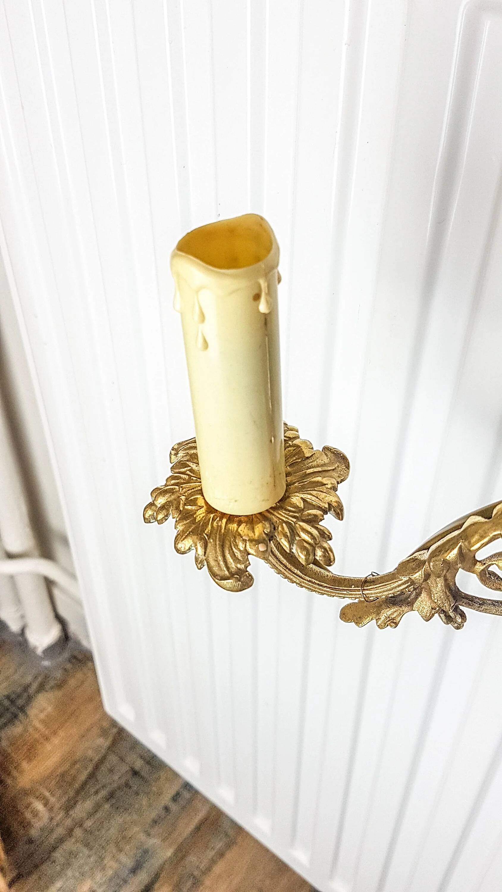 Bronze wall sconce in Empire style