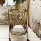 Cart serves brass bar