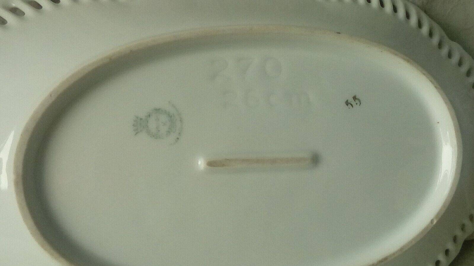 Openwork porcelain basket with fruit still life decor