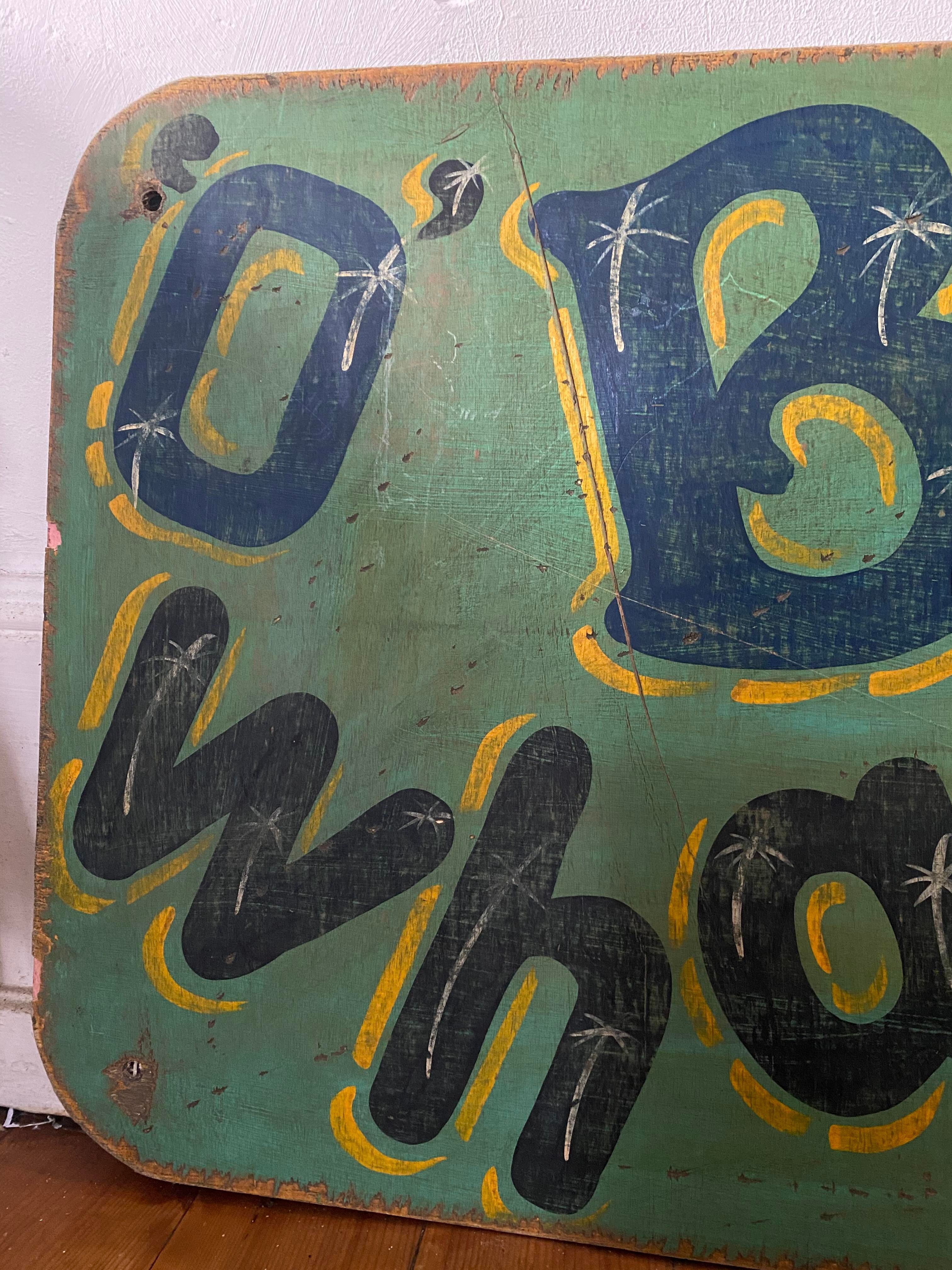 Painted amusement park or funfair sign