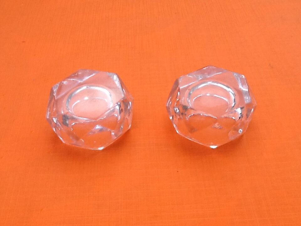 Pair of geometrizing shaped saltrons in cut glass