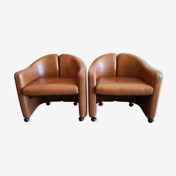 Pair of leather armchairs by Eugenio Gerli