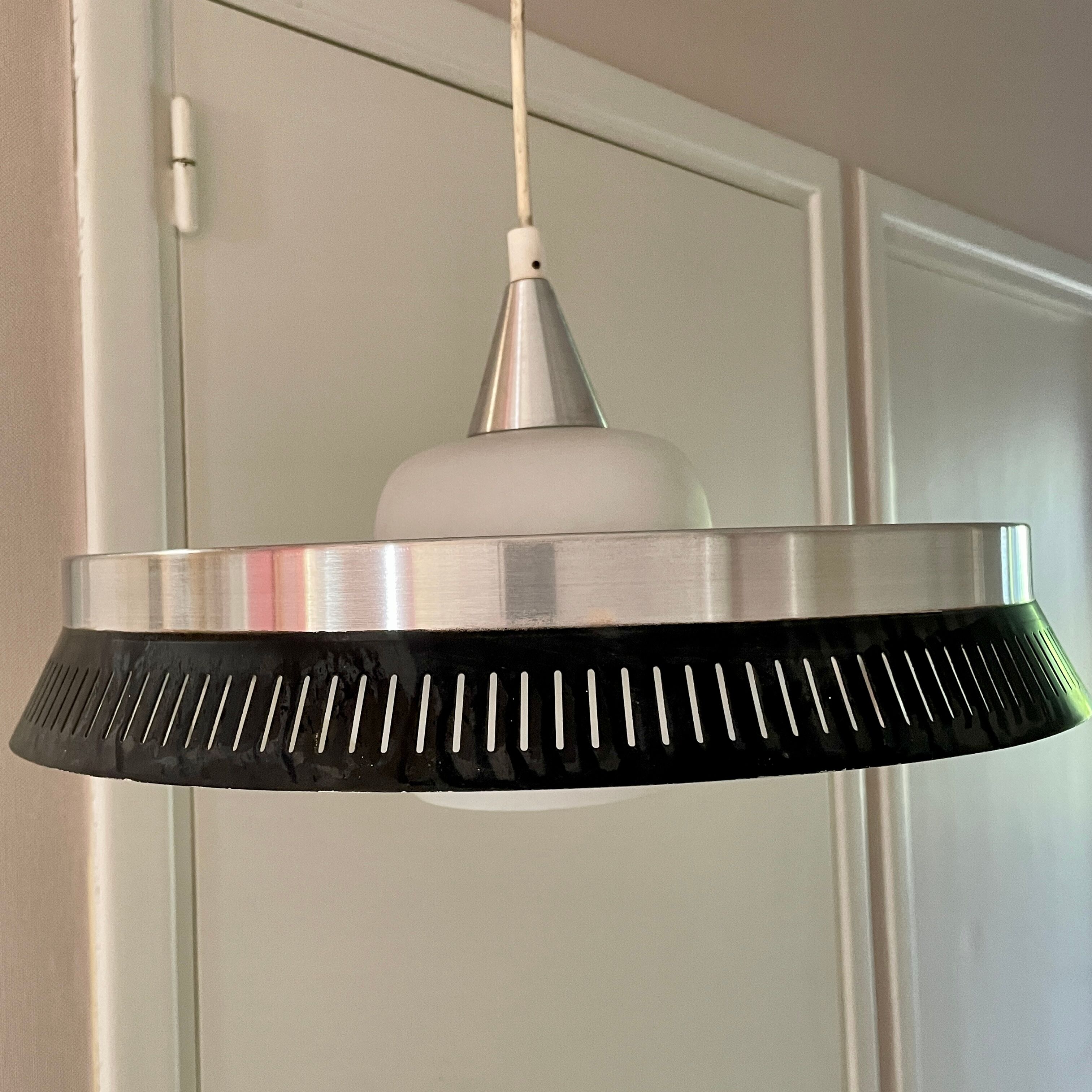 Scandinavian Fog & Murop pendant lamp in glass and perforated metal