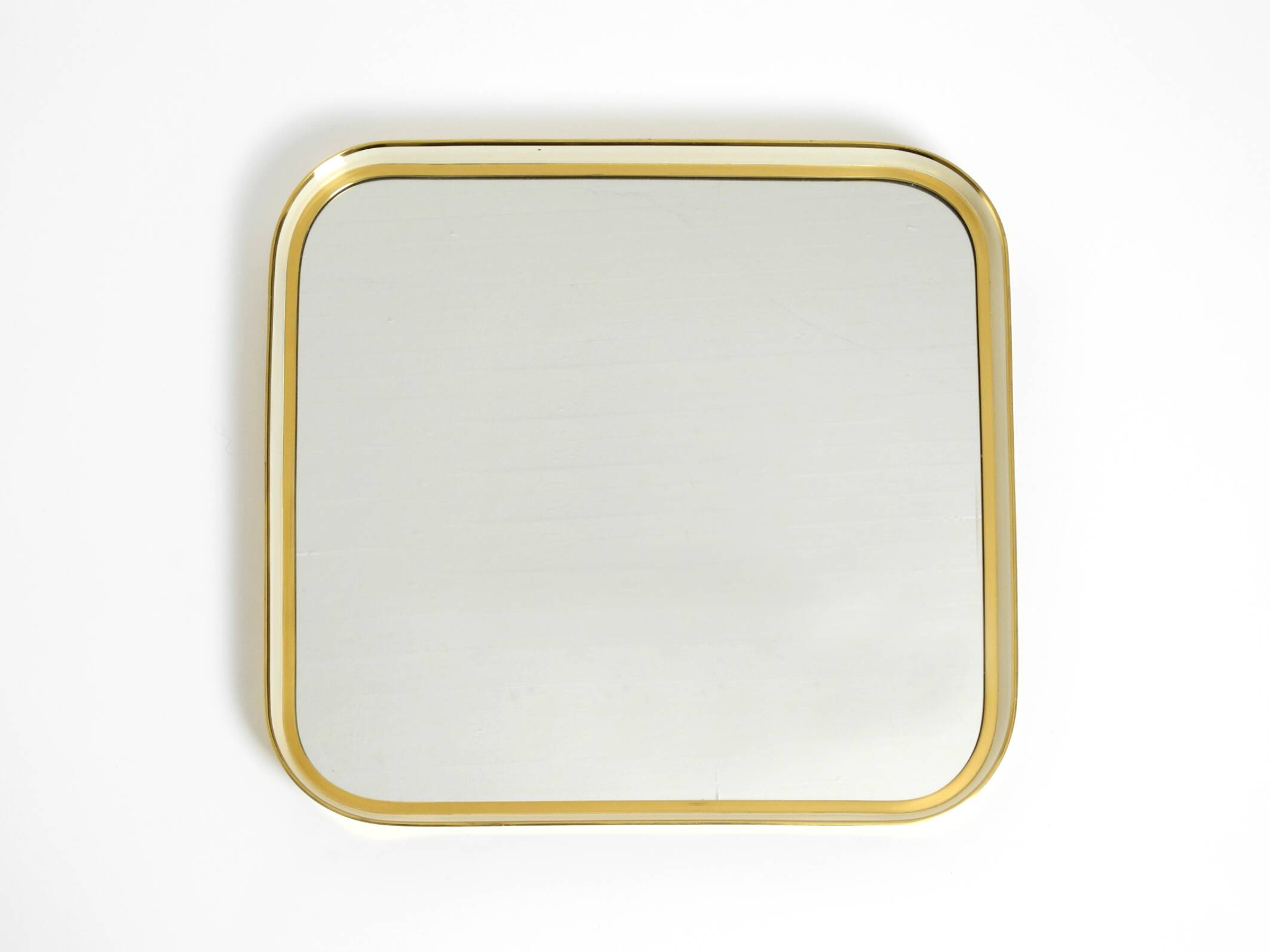 Beautiful original Mid Century Modern "Zier-Form" wall mirror with heavy br