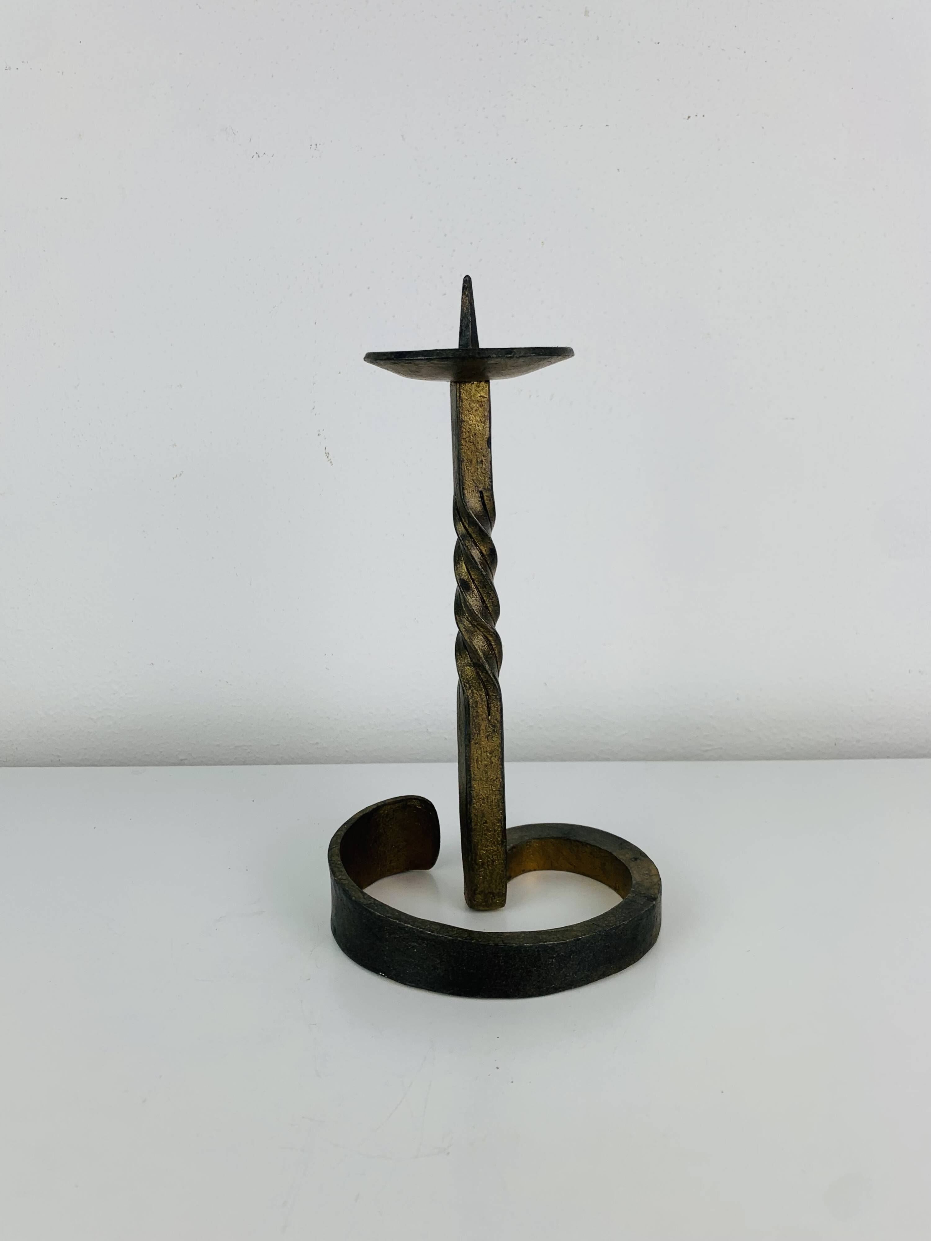 Brutalist candle holder, wrought iron with a golden patina.