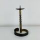 Brutalist candle holder, wrought iron with a golden patina.