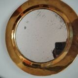 Pretty round mirror in brass and quilted glass