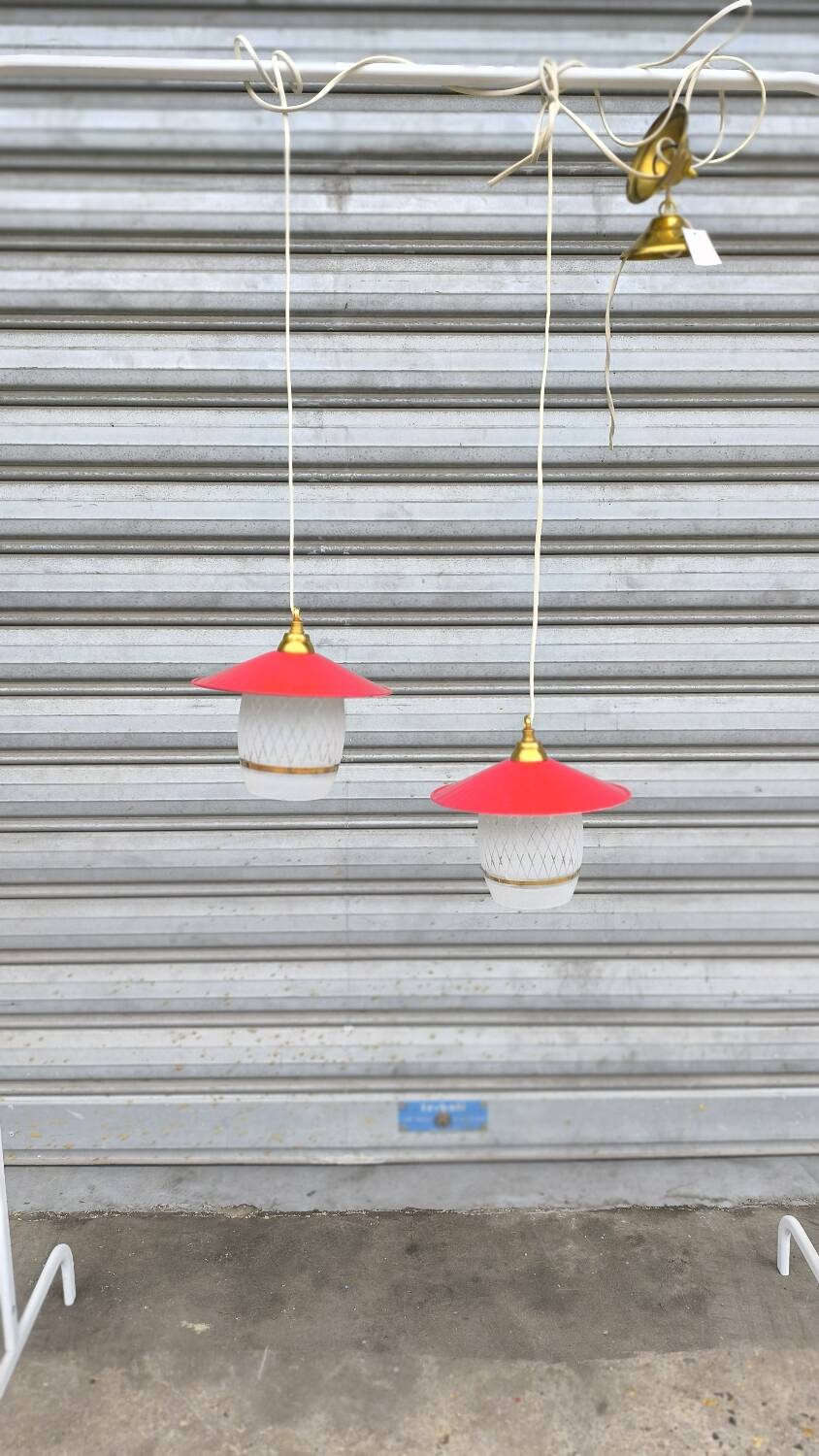 Pair of enamelled sheet metal and glass pendant lights