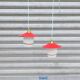 Pair of enamelled sheet metal and glass pendant lights