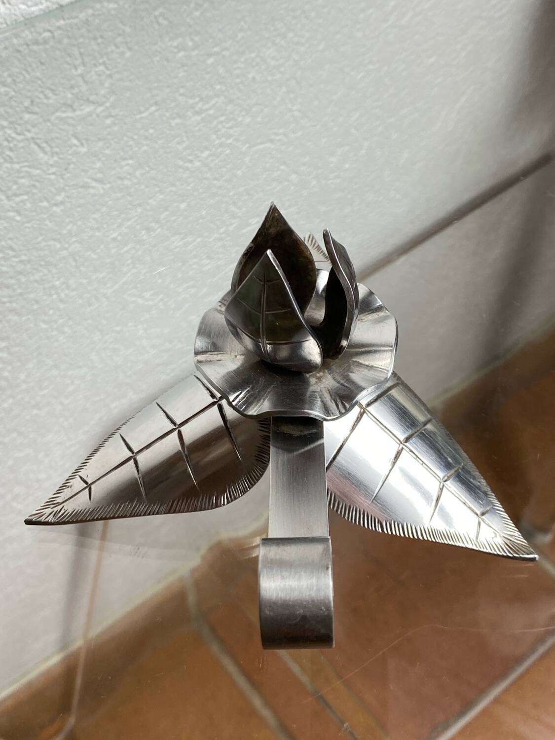 Silver-plated metal flower candle holder