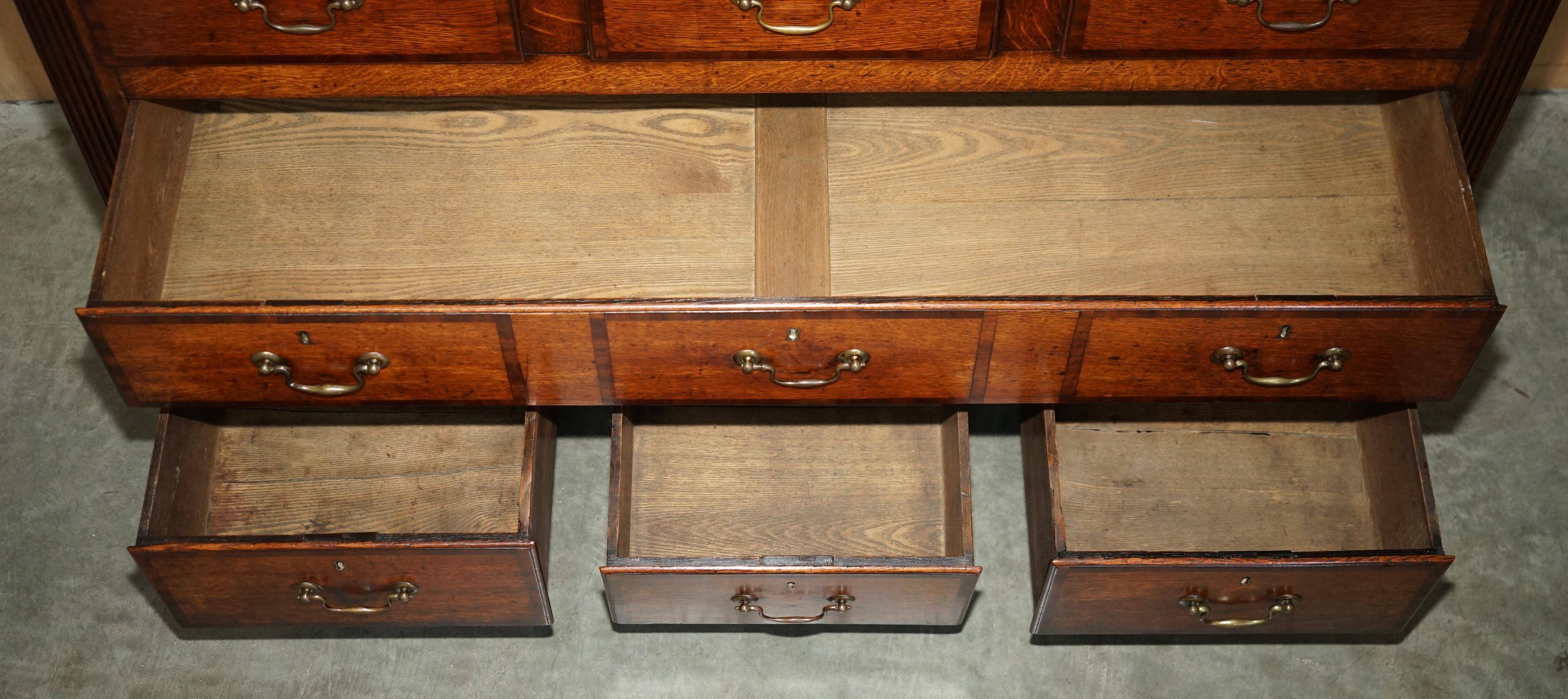 Georgian oak commode with a folding top, English, 18th century.