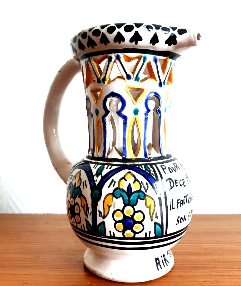 Deceptive pitcher in glazed earthenware