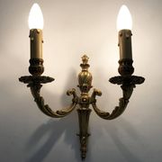 Old pair of bronze double-light wall sconces. 60s