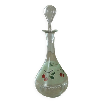 Glass carafe with enamel decoration of cherries.
