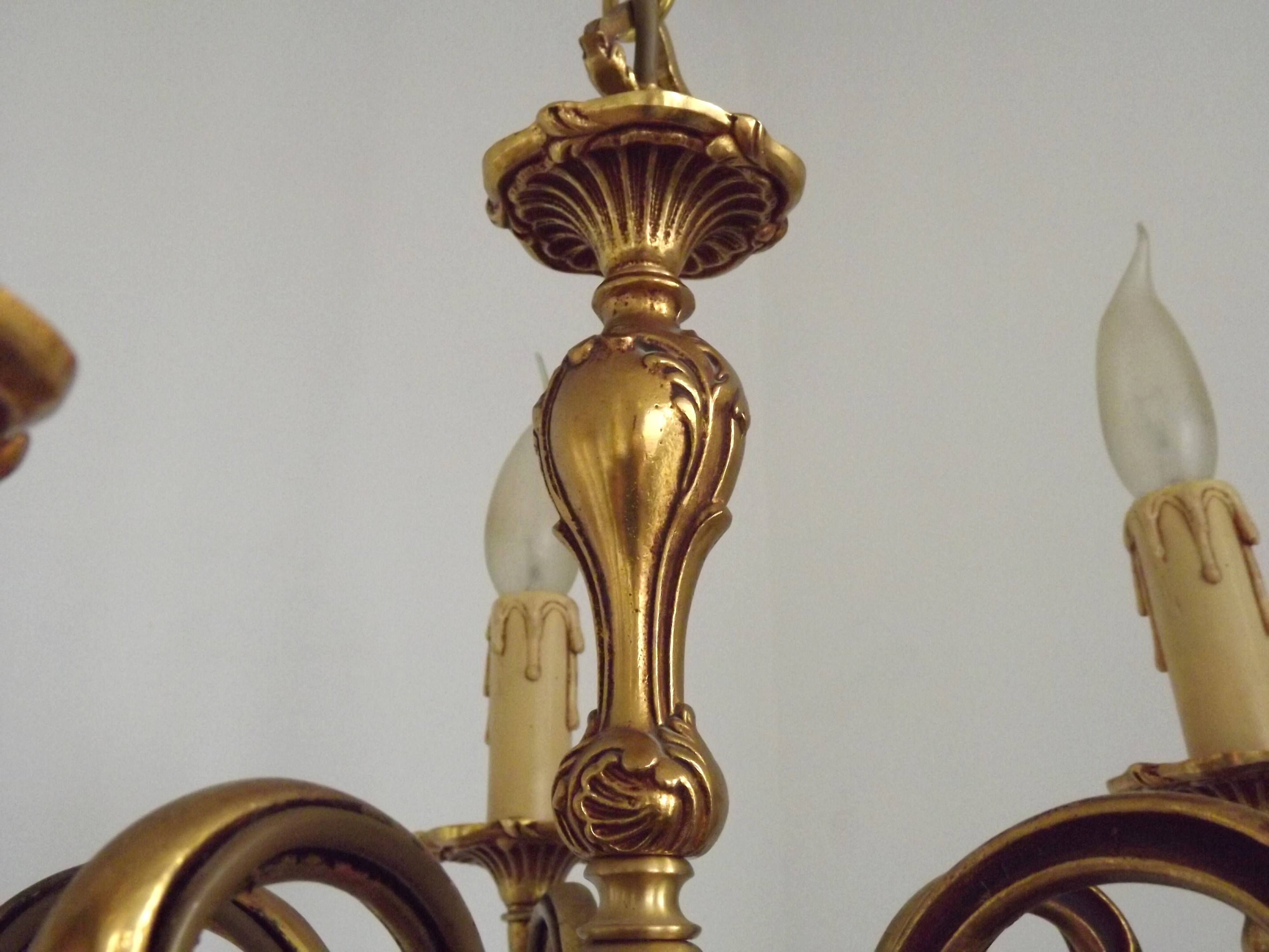 Vintage French traditional style bronze chandelier with 5 lights featuring acanthus leaf details.