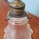 Bronze wall light with grooved clear glass, early 20th century