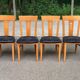 4 Scandinavian dining chairs in solid wood and black fabric from the 1990s.