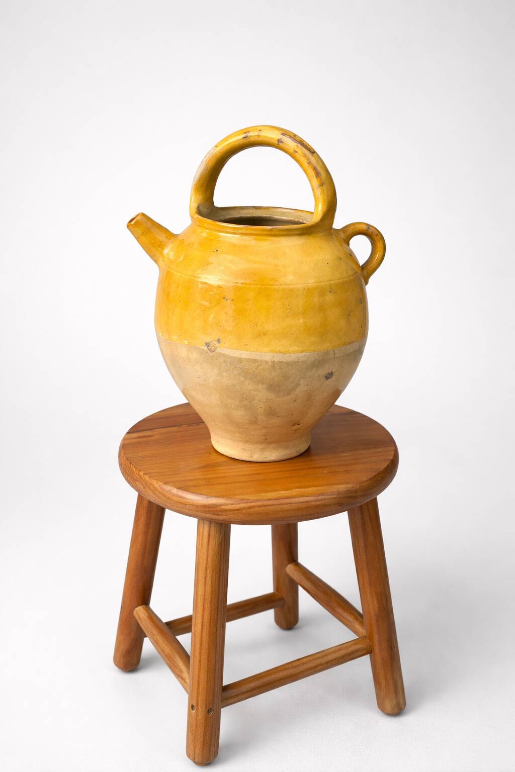 Old yellow glazed earthenware jug – Provençal spirit