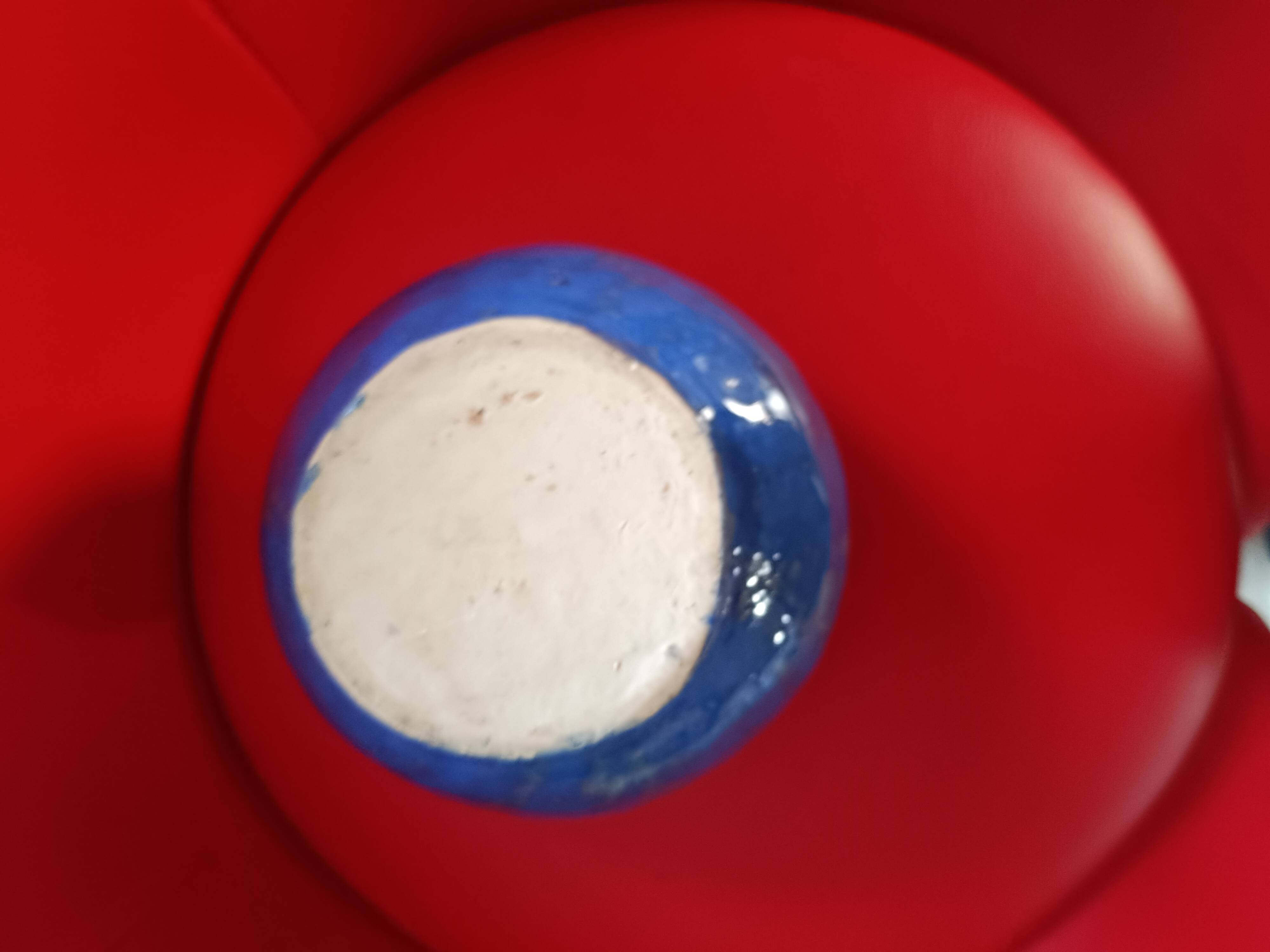 Large blue glazed stoneware bowl.