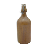 Small wooden sandstone bottle