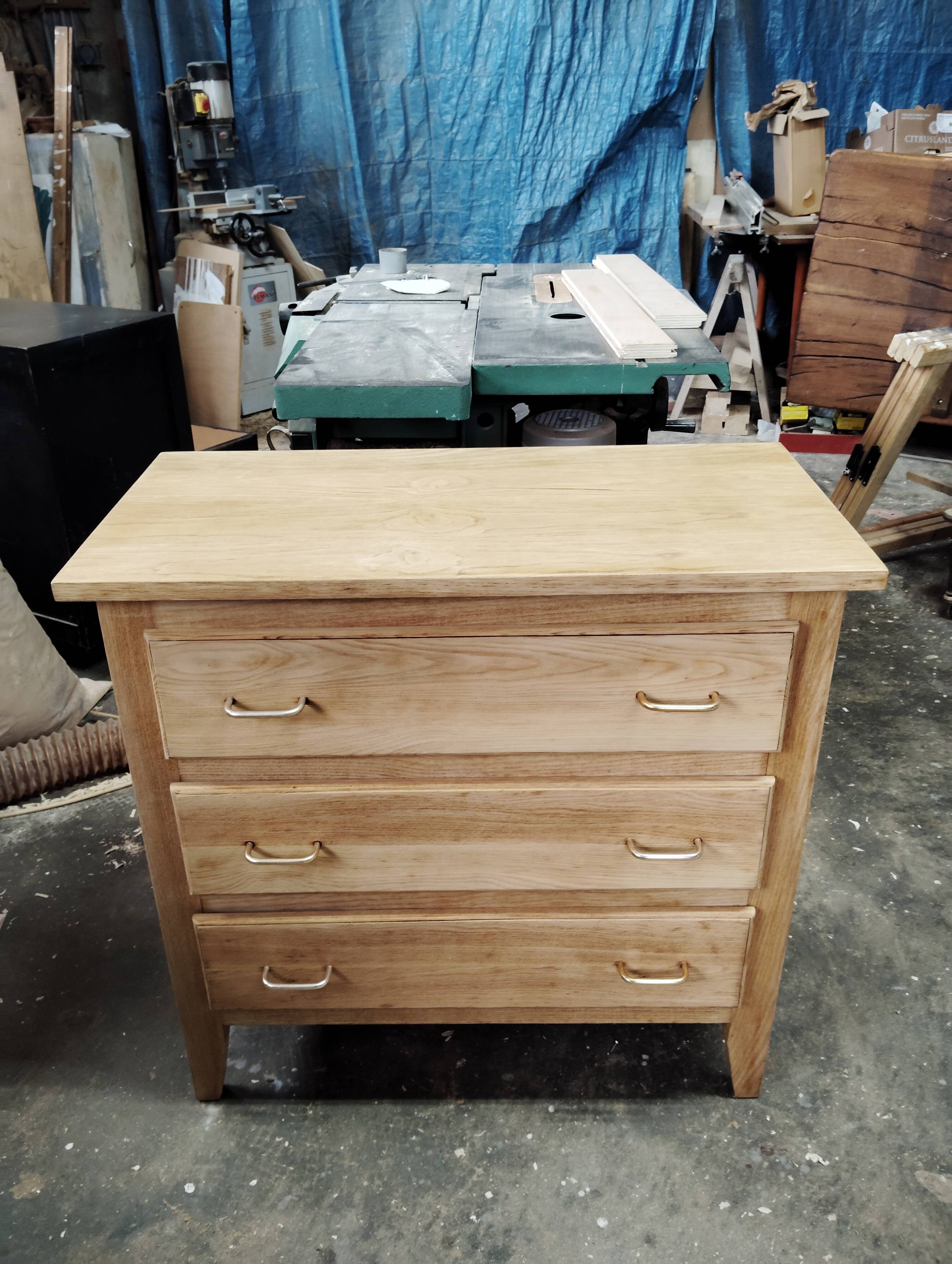 Small oak chest of drawers with compass feet