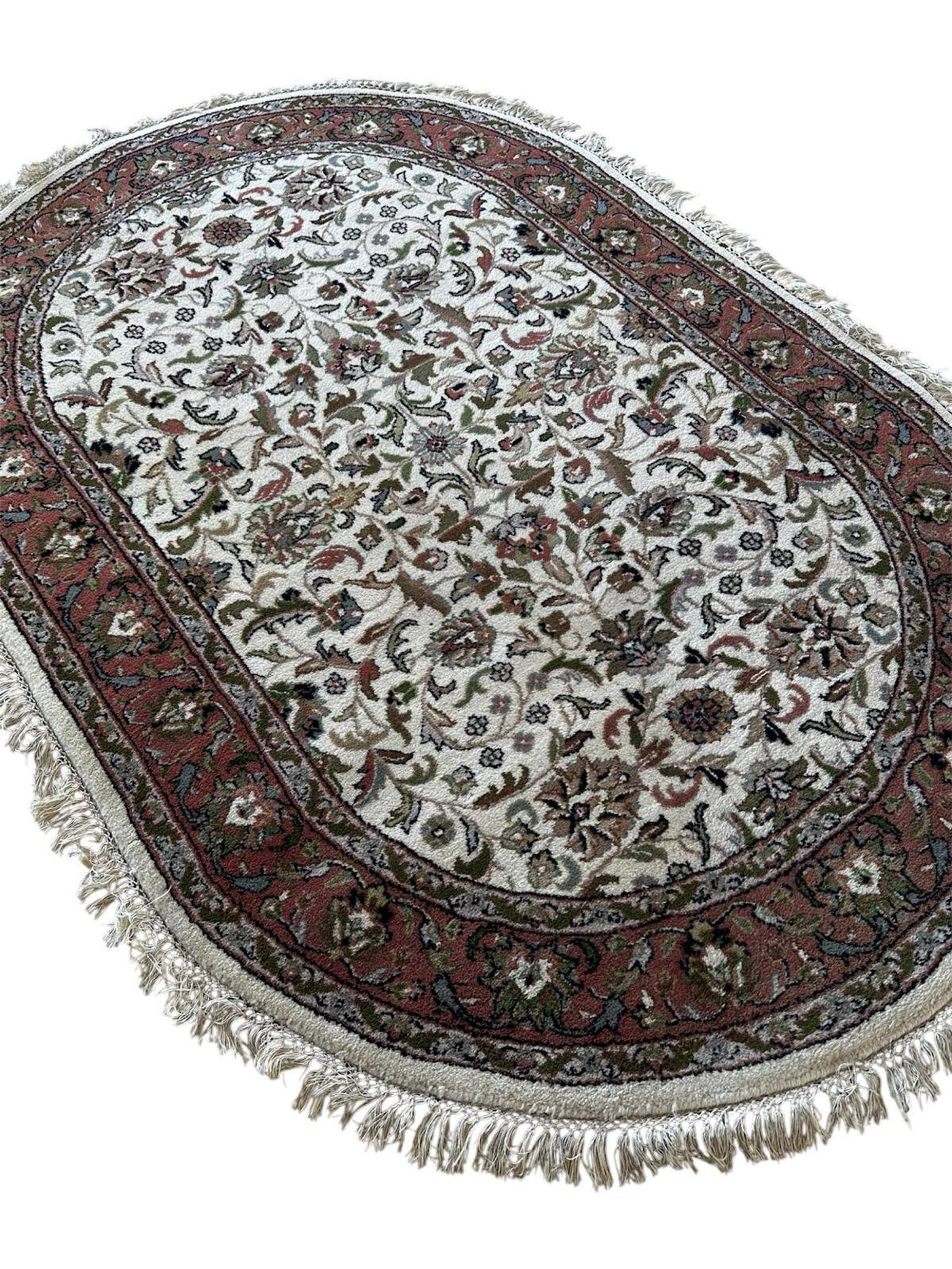 Handmade oval Persian rug 185cm x 120cm